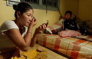 The many faces of a Cambodian entertainment worker